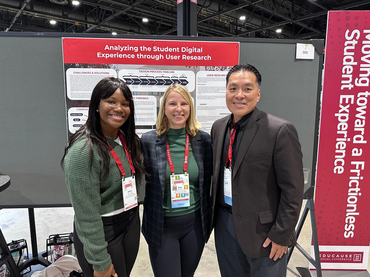 Allison Green, Kate Miffitt, and colleague Max Tsai presenting conference poster